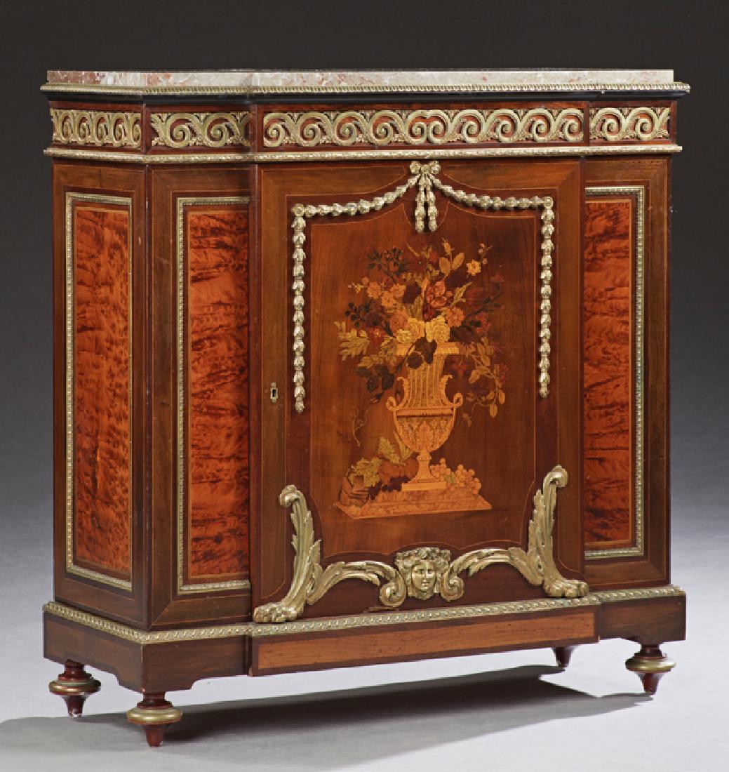 French Belle Epoque Marquetry Inlaid Ormolu: French Belle Epoque Marquetry Inlaid Ormolu Mounted Marble Top Parlor Cabinet, early 20th c., the highly figured brown marble over a breakfront with an ormolu frieze above a large marquetry inlaid doo