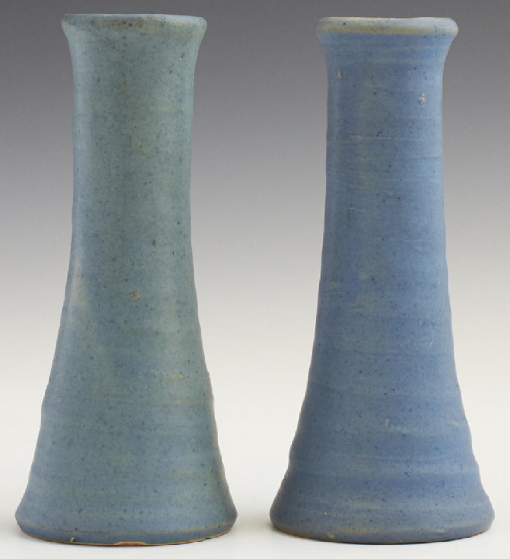 Pair of Newcomb Pottery Glazed Blue Tapered Vases,: Pair of Newcomb Pottery Glazed Blue Tapered Vases, 20th c., with ribbed decoration, thrown by Joseph Meyer, the underside impressed "JM, NC," H.- 6 in., Dia.- 2 5/8 in. Provenance: The Estates of Dr.