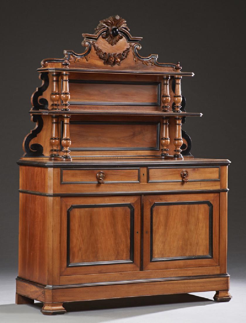 French St. Hubert Style Carved Walnut Sideboard,: French St. Hubert Style Carved Walnut Sideboard, c. 1900, the arched leaf carved crest over a relief fruit garland and two shelves with turned tapered supports, on a base with two drawers above double