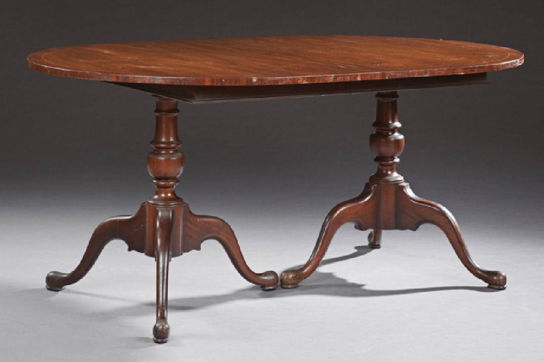 English Queen Anne Style Inlaid Carved Mahogany Double: English Queen Anne Style Inlaid Carved Mahogany Double Pedestal Dining Table, 20th c., the line inlaid oval top on turned tapered baluster supports to tripodal bases with pad feet, H.- 29 in., W.- 66