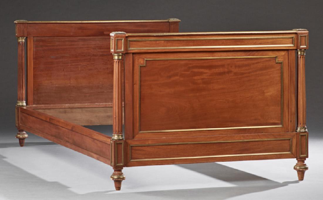 French Empire Style Ormolu Mounted Day Bed, early 20th: French Empire Style Ormolu Mounted Day Bed, early 20th c., the brass mounted sleigh ends with ormolu mounted reeded columns, to mahogany rails, on brass mounted turned feet, H.- 33 1/2 in., Int. W.- 4