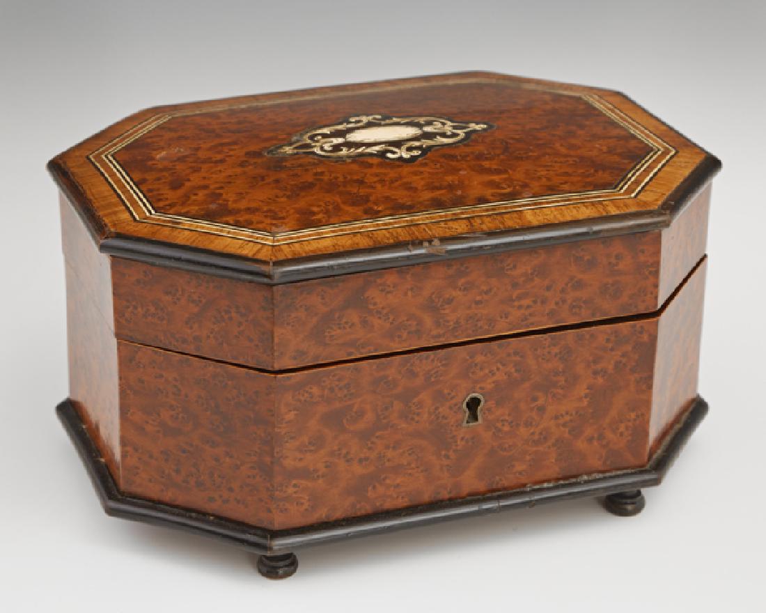 French Bone and Line Inlaid Octagonal Jewel Casket, c.: French Bone and Line Inlaid Octagonal Jewel Casket, c. 1870, the interior lined in tufted red silk, on four turned legs, H.- 3 7/8 in., W.- 8 in., D.- 5 1/2 in.