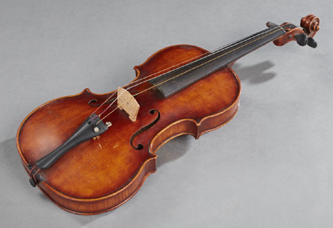 John Juzek Violin, early 20th c., Prague, labeled, with: John Juzek Violin, early 20th c., Prague, labeled, with two bows and original case, Violin- H.- 4 1/4 in., W.- 24 in., D.- 8 1/6 in.