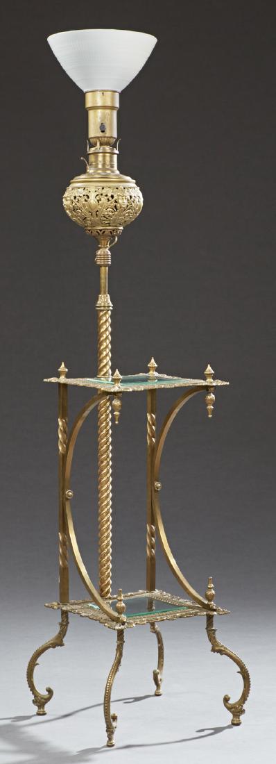 French Brass Organ Lamp, 19th c., the pierced: French Brass Organ Lamp, 19th c., the pierced adjustable font on a twisted brass support to an upper table with a glass inset, on twisted and scrolled supports to a like glass inset table, on scrolled