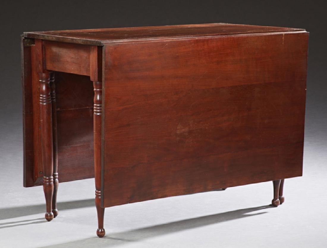 American Federal Style Carved Cherry Drop Leaf Gate: American Federal Style Carved Cherry Drop Leaf Gate Dining Table, 19th c., the rectangular top to ring turned tapered legs on ball feet, H.- 31 in., W.- 23 1/2 in., Open W.- 72 in., D.- 43 in. Provena
