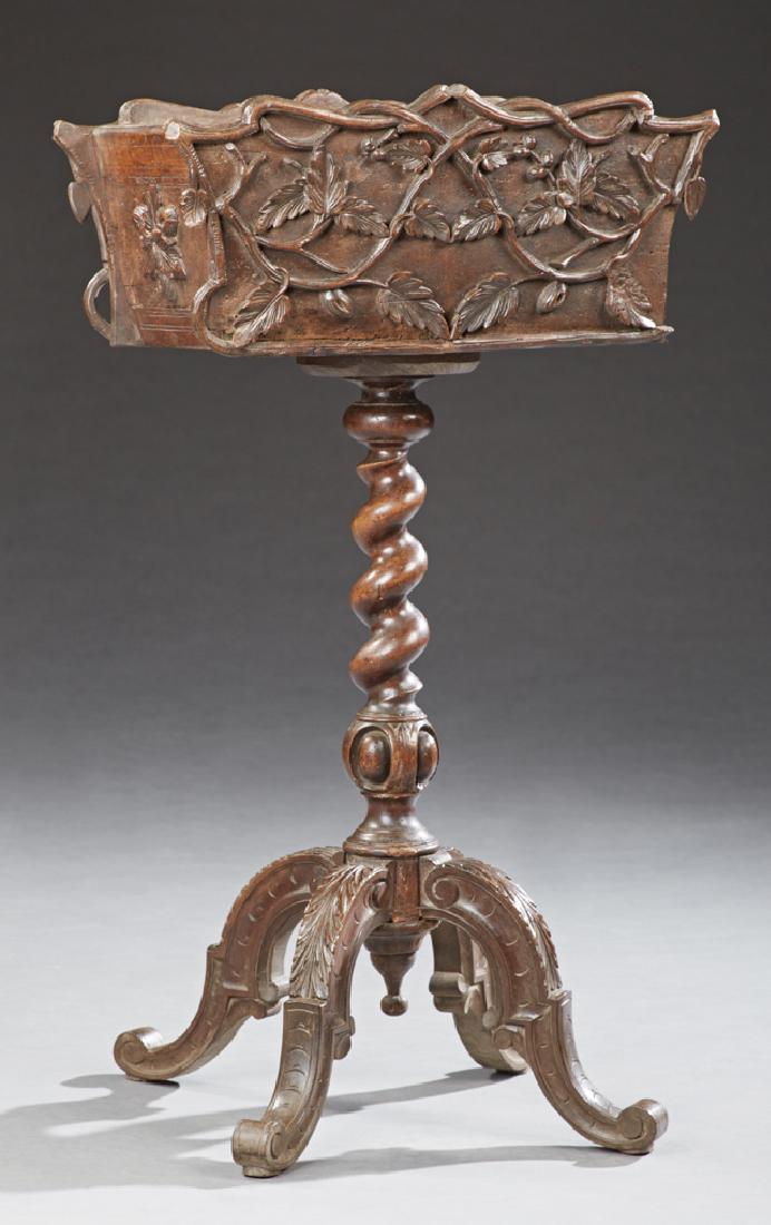 French Henri II Style Carved Oak and Cherry Planter,: French Henri II Style Carved Oak and Cherry Planter, circa 1880, the tapered jardiniere with relief leaves and nuts, on a twist carved support to four acanthus carved cabriole legs with scrolled feet,