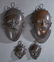 Four Benin Bronze Masks, 20th c., two large and two