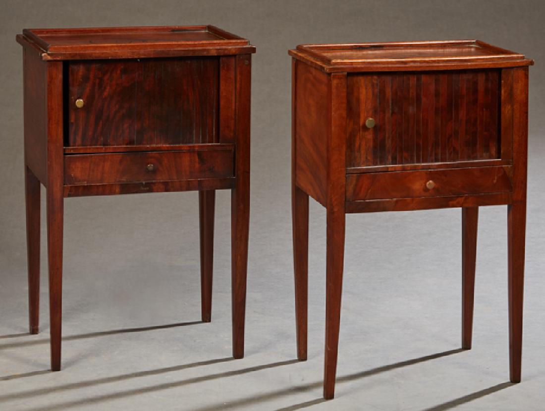 Pair of French Louis XVI Style Mahogany Nightstands,: Pair of French Louis XVI Style Mahogany Nightstands, late 19th c., the dished tops over tambour doors and lower drawers, on tapered square legs, H.- 28 1/2 in., W.- 18 1/2 in., D.- 13 1/4 in.