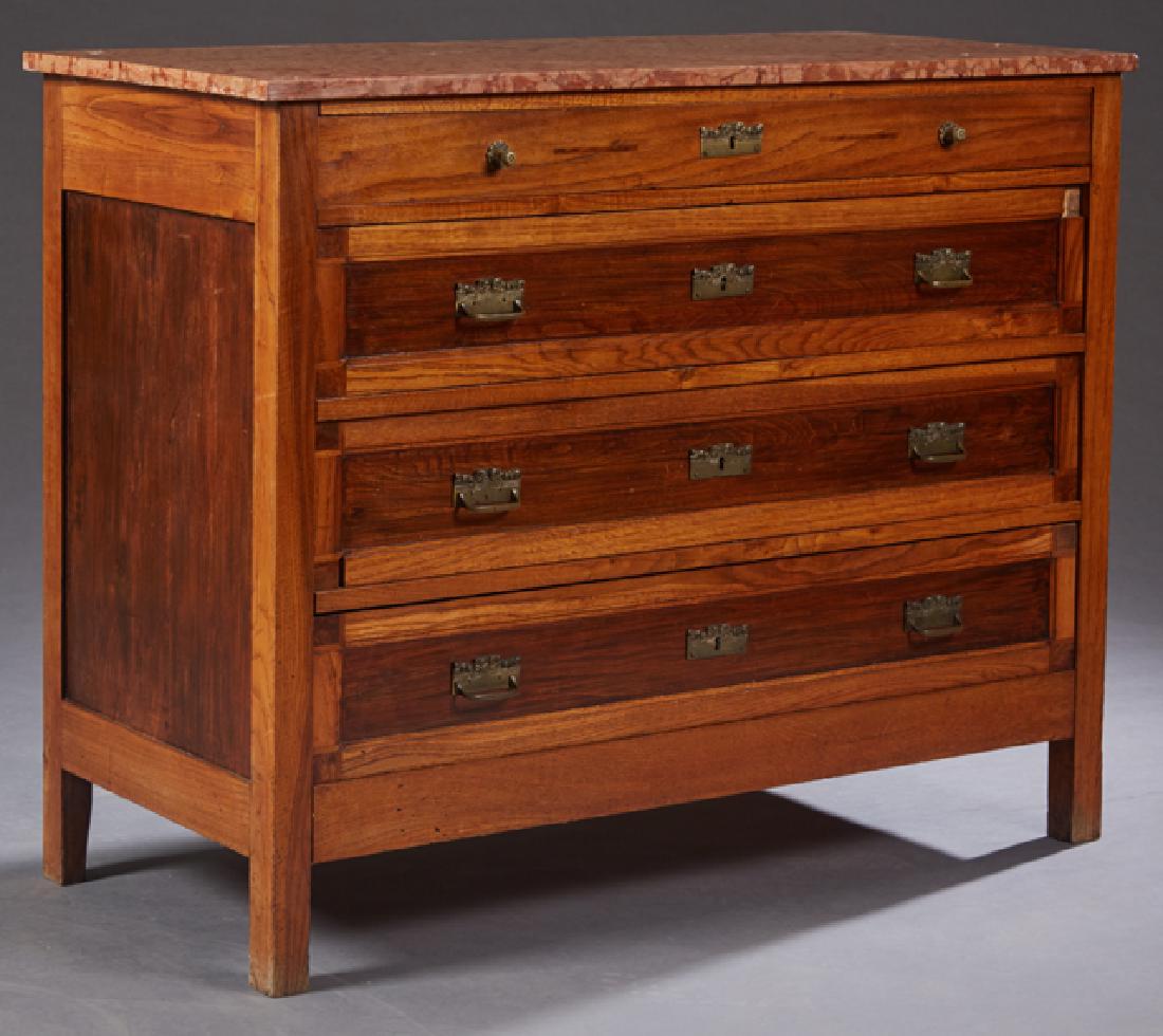 French Carved Oak Marble Top Commode, c. 1900, the: French Carved Oak Marble Top Commode, c. 1900, the highly figured rouge marble over four drawers and a "secret" bottom compartment, on block feet, H.- 38 in., W.- 47 3/4 in., D.- 21 3/8 in.