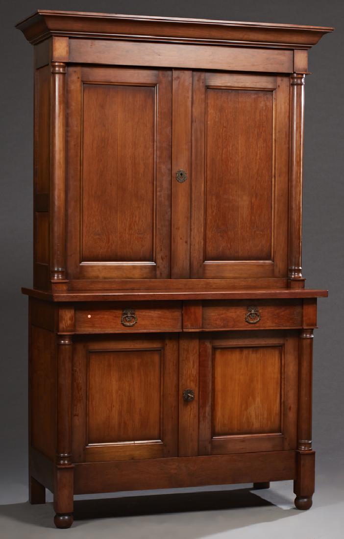 French Provincial Carved Cherry Buffet a Deux Corps,: French Provincial Carved Cherry Buffet a Deux Corps, 20th c., the stepped ogee crown over double setback cupboard doors, flanked by engaged columns, on a base with two frieze drawers over setback cupb