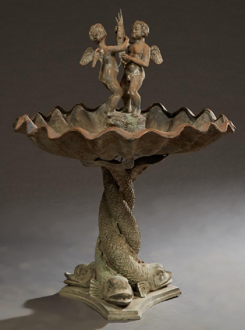 Patinated Bronze Fountain, 20th c., with two winged: Patinated Bronze Fountain, 20th c., with two winged putti holding a swordfish, in the center of a large circular shell, on a tripodal entwined dolphin fish support, on a stepped tripodal base, H.- 47