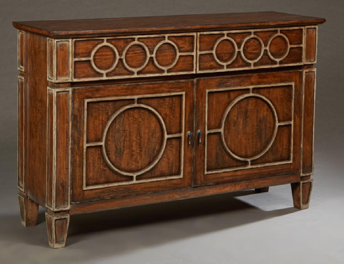 Louis XVI Style Carved Mahogany and Polychromed: Louis XVI Style Carved Mahogany and Polychromed Sideboard, 20th c., the rectangular top over double frieze drawers with polychromed silver decoration, over like decorated double cupboard doors, on tap