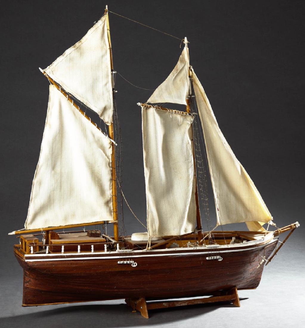 Wooden Ship's Model, 20th c., of a two masted schooner, (1 of 4)