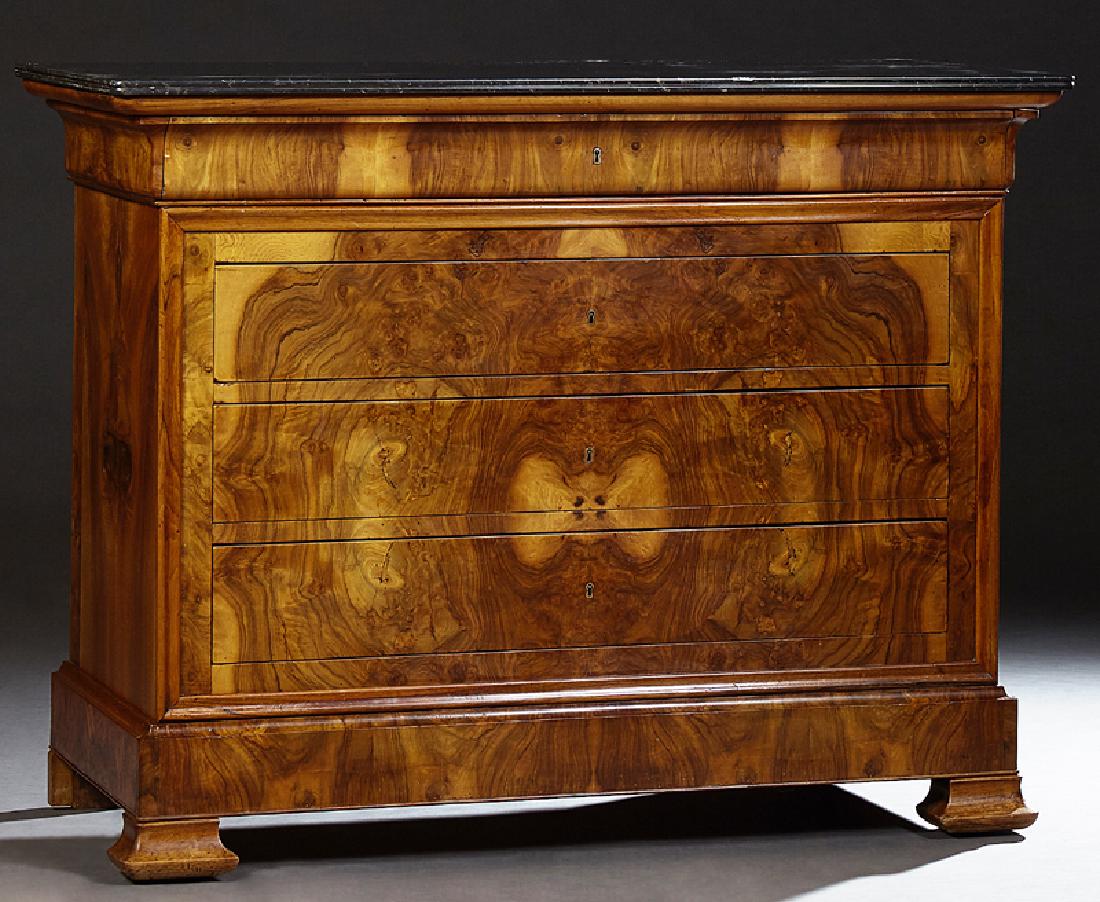 French Louis Philippe Highly Figured Burled Elm Marble: French Louis Philippe Highly Figured Burled Elm Marble Top Commode, 19th c., the reeded edge figured black marble over a cavetto frieze drawer, above three setback drawers, on a plinth base on ogee bl
