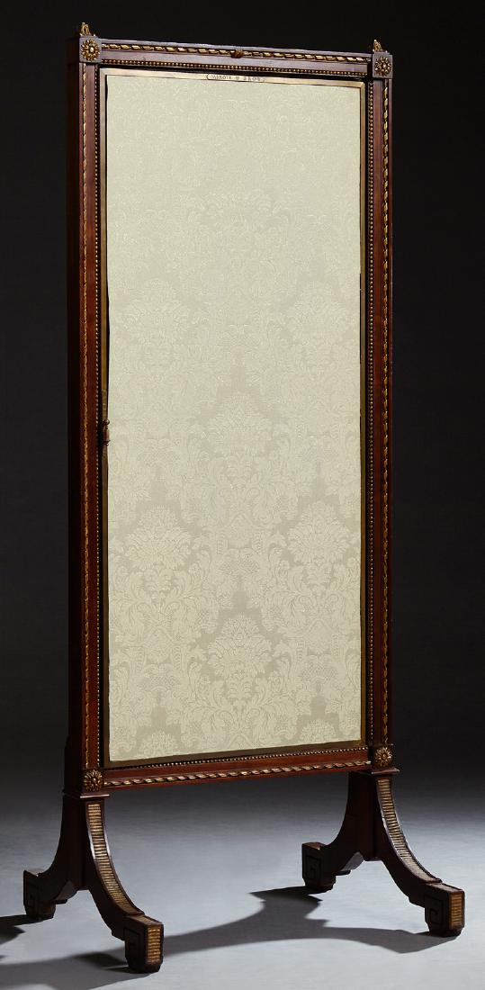 Trifold Mirror Brot Cheval Dressing Mirror, Late 19th: Trifold Mirror Brot Cheval Dressing Mirror, Late 19th c., with a mahogany frame with trestle supports, each mirror backed by a silk panel, labeled, H.- 69 in., W.- Closed- 27 in., Open- 70 in., D.- 16