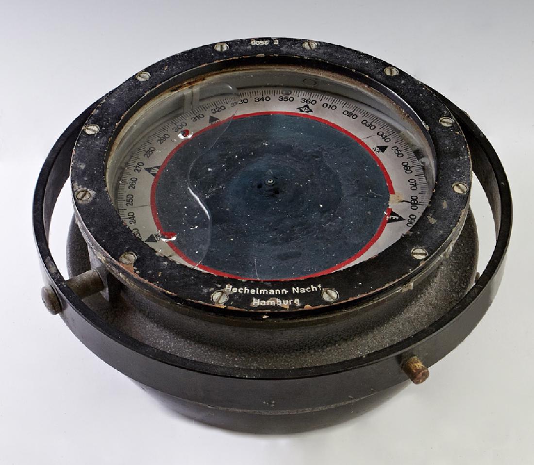Rare Georg Hechelmann Gimballed Marine Compass, 20th: Rare Georg Hechelmann Gimballed Marine Compass, 20th c., Hamburg, # E 2506, in a black finish, now lacking the wooden case, H.- 4 in., Dia.- 9 3/4 in.