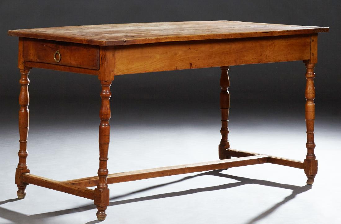 French Provincial Louis XV Style Carved Cherry: French Provincial Louis XV Style Carved Cherry Farmhouse Table, 19th c., and six stools, the rectangular top over a wide skirt with one end drawer, on turned tapered legs joined by an H-form stretcher