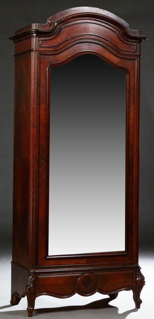 French Louis XV Style Carved Walnut Bonnetiere, early: French Louis XV Style Carved Walnut Bonnetiere, early 20th, the arched ogee crown above a wide beveled mirrored door, over a long drawer, on scrolled cabriole legs with toupie feet, H.- 87 1/2 in., W.