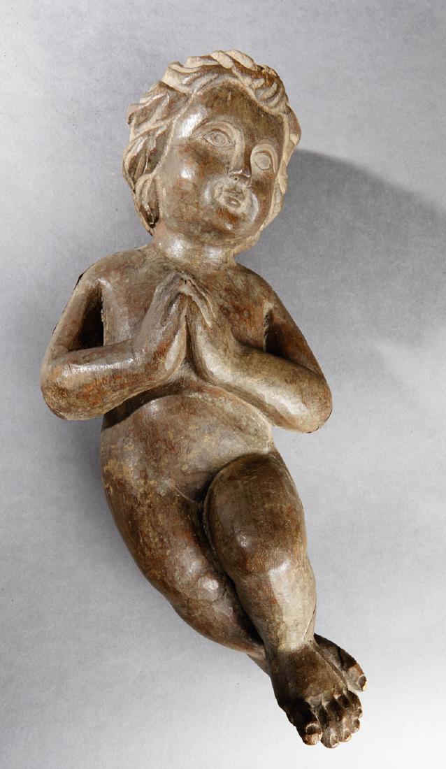 Continental Carved Mahogany Figure of a Putto at (1 of 1)