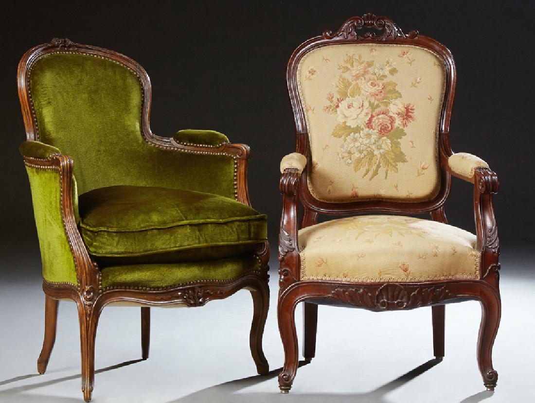 Two French Louis XV Style Mahogany Armchairs, late 19th: Two French Louis XV Style Mahogany Armchairs, late 19th c., one a fauteuil with Aubusson style floral upholstery; the second a bergere with a floral carved crest rail, over an upholstered back and arm