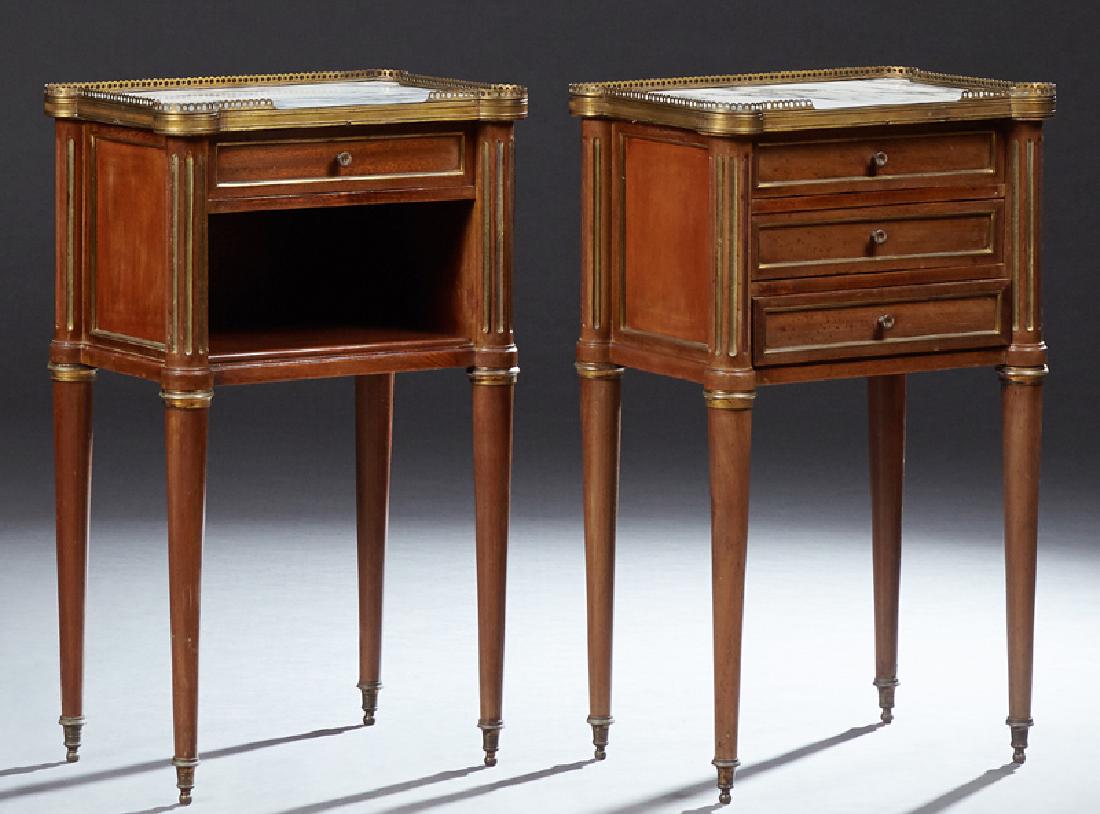 Pair of French Louis XVI Style Marble Top Ormolu: Pair of French Louis XVI Style Marble Top Ormolu Mounted Mahogany Nightstands, early 20th c., the cookie corner three quarter pierced brass ormolu gallery surrounding an inset highly figured white mar