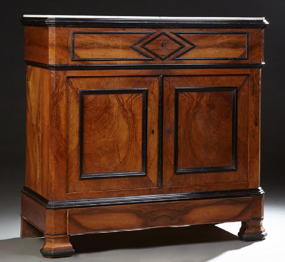 French Louis Philippe Style Carved Walnut Marble Top: French Louis Philippe Style Carved Walnut Marble Top Sideboard, c. 1880, the inset canted corner white marble over a frieze drawer and double cupboard doors, enclosing three slides, on a plinth base o