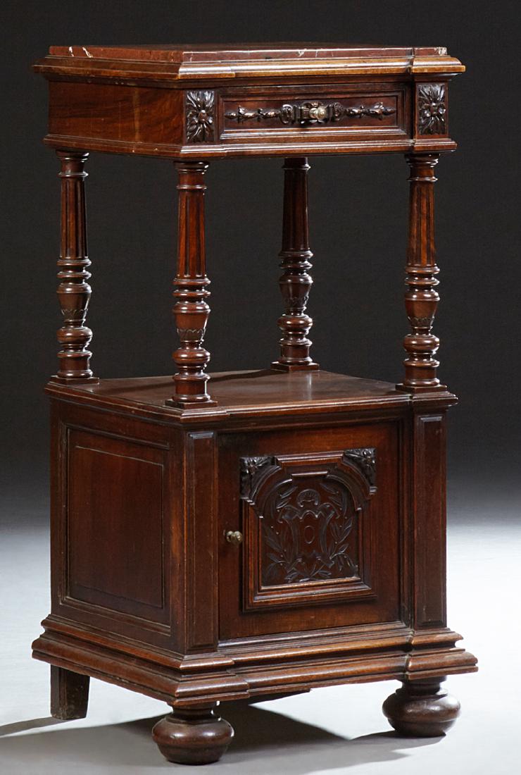 French Henri II Style Carved Walnut Marble Top: French Henri II Style Carved Walnut Marble Top Nightstand, 19th c., the inset rouge marble stepped breakfront top above a setback frieze drawer with fluted turned and tapered supports to a lower setba
