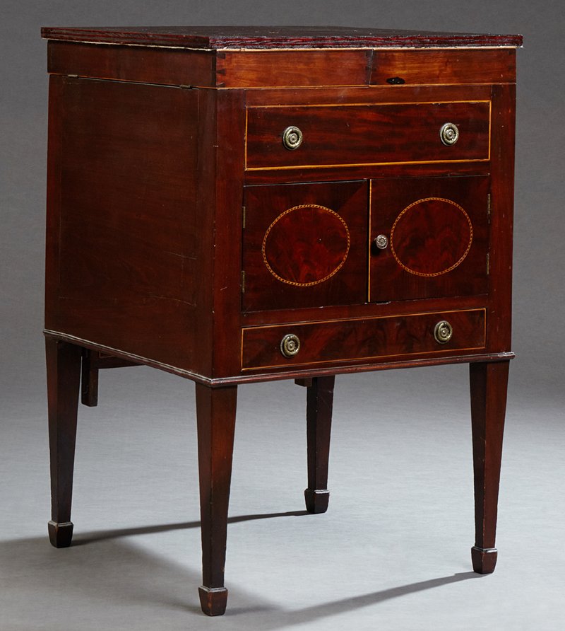 English Inlaid Mahogany Beau Brummell, c. 1800, the: English Inlaid Mahogany Beau Brummell, c. 1800, the fold out lid enclosing a lift-up mirror and a space for a wash basin above a faux drawer, two doors and a single drawer, on square tapered legs endi