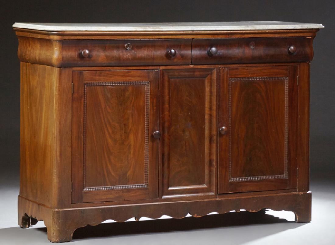 American Classical Carved Mahogany Sideboard, 19th c.,: American Classical Carved Mahogany Sideboard, 19th c., the ogee edge rounded corner highly figured white marble over two frieze drawers above double cupboard doors, on a plinth base on bracket feet, H