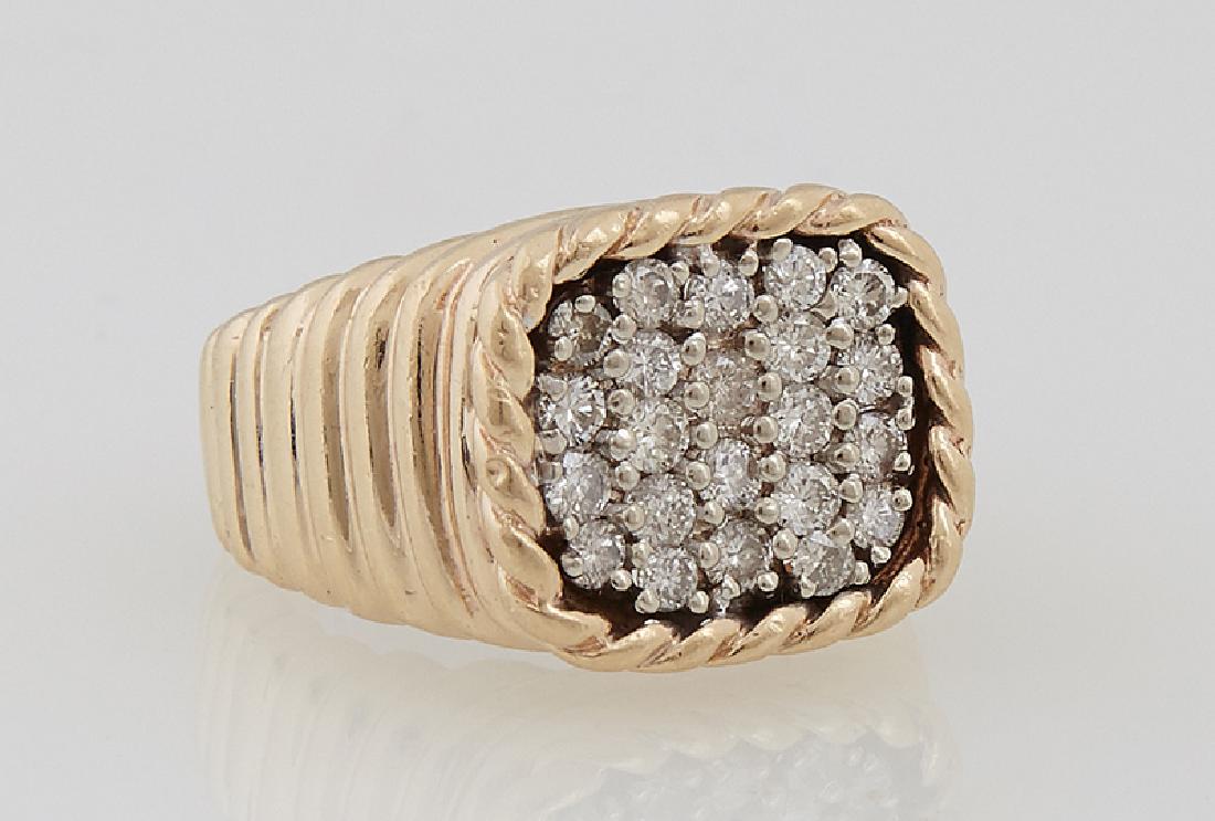 Lady: Lady's 14K Yellow Gold Dinner Ring, the top with 23 small round diamonds and faux diamonds, over a tapering ridged band, Wt.- .41 Troy Oz. Provenance: Property Seized by the New Orleans Police Departm