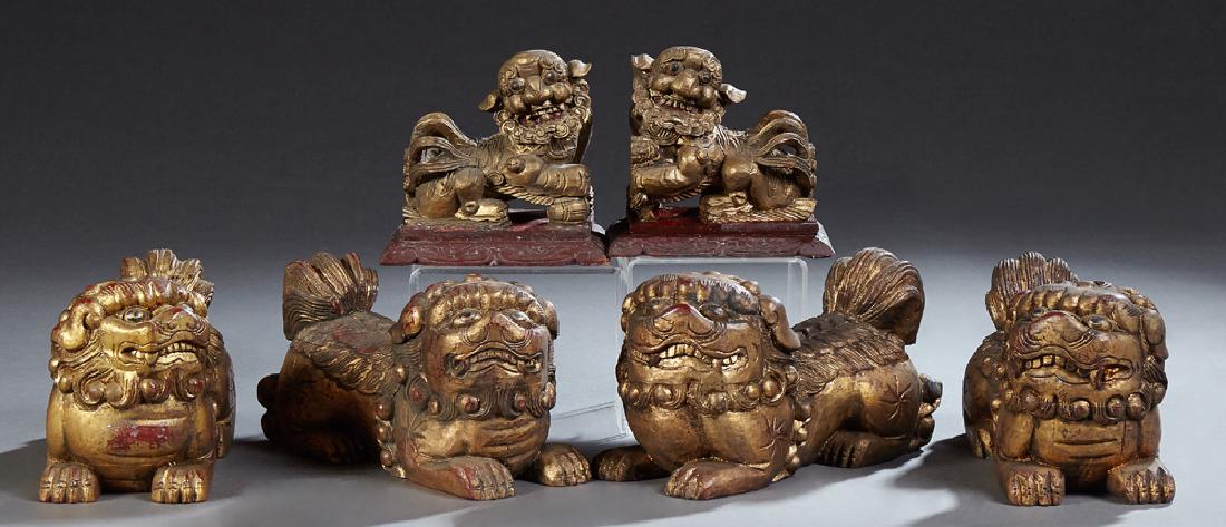 Three Pairs of Chinese Carved Giltwood Foo Dragons,: Three Pairs of Chinese Carved Giltwood Foo Dragons, 20th c., Largest- H.- 6 1/4 in., W.- 10 in., D.- 4 1/4 in., (6 Pcs.) Provenance: from the Estate of Kathryn Hargesheimer, New Orleans, Louisiana.