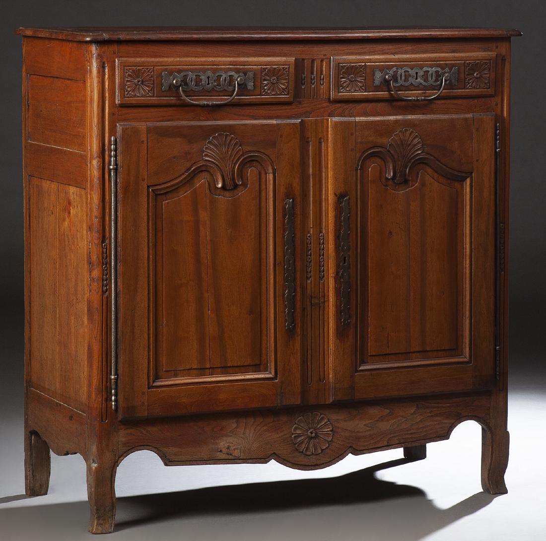 French Provincial Louis XV Style Carved Cherry: French Provincial Louis XV Style Carved Cherry Sideboard, 19th c., the rounded corner and edge three board top over two frieze drawers above large double arched fielded panel cupboard doors, with long