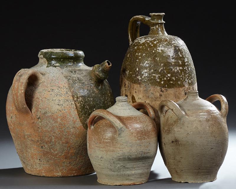 Group of Four French Provincial Earthenware Wine Jars,: Group of Four French Provincial Earthenware Wine Jars, 19th c., three with double ring handles, one with a single ring handle, glazed, H.- 20 1/2 in., W.- 11 in., D.- 13 1/2 in., (4 Pcs.)