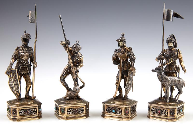 Set of Four German Gilt Silver Miniature Figures, early: Set of Four German Gilt Silver Miniature Figures, early 20th c., of knights in armor, with movable visors, two with original bone faces, on pierced octagonal bases mounted with cabochon semi-precious