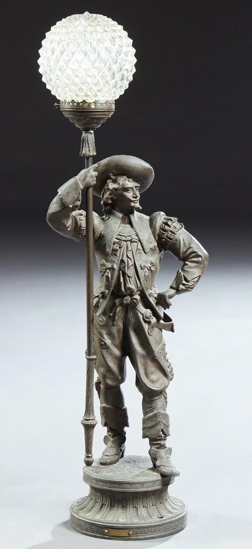 Auguste Poitevin (1819-1873, French), "Tete Ronde,": Auguste Poitevin (1819-1873, French), "Tete Ronde," late 19th c., patinated spelter figure, with a brass name plate "Clarence," on an integral stepped circular base, now wired as a newel post lamp, H.