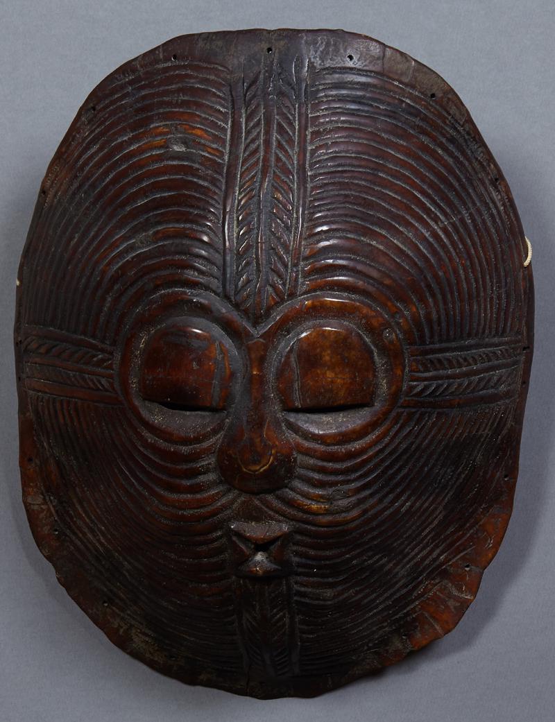 Group of Two New Guinea Masks, early 20th c., one of (1 of 1)