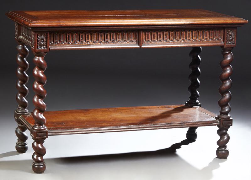 French Provincial Louis XIII Style Carved Oak Serving: French Provincial Louis XIII Style Carved Oak Serving Trolley, 19th c., the stepped fold over top over two frieze drawers, on large rope twist supports to a lower shelf on rope twist legs, H.- 37 1/2