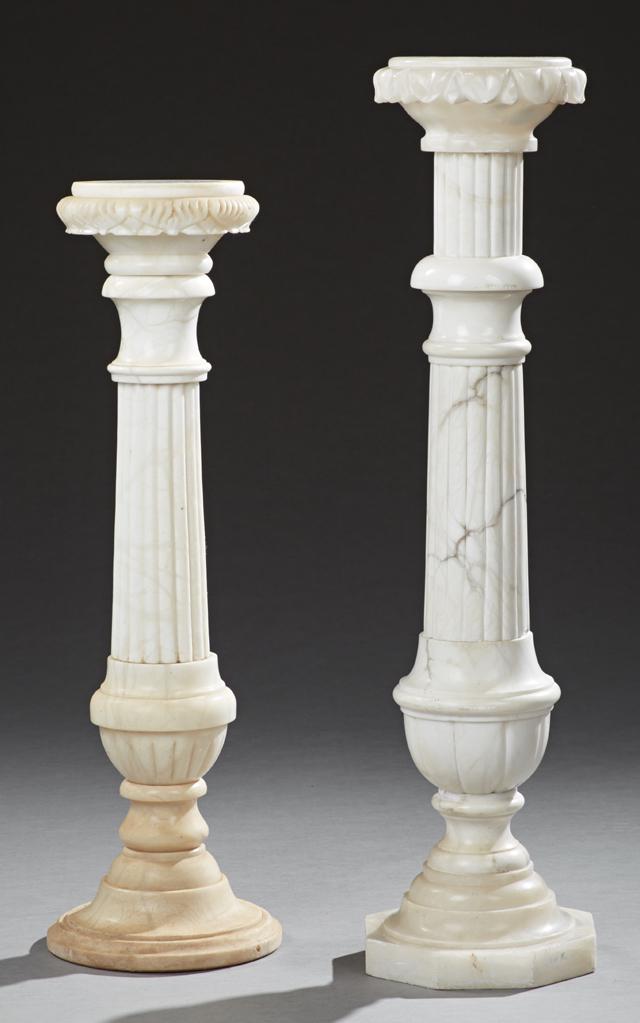 Near Pair of Carved Alabaster Pedestals, early 20th c.,: Near Pair of Carved Alabaster Pedestals, early 20th c., both with circular tops on reeded supports, one with a stepped octagonal base the second with a stepped circular base, Octagonal- H.- 41 1/2 in.