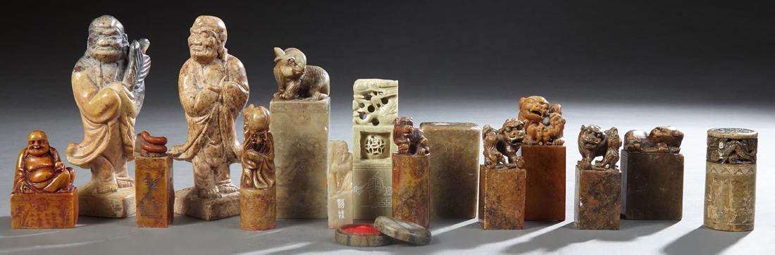 Group of Fifteen Chinese Carved Soapstone Chops, 19th: Group of Fifteen Chinese Carved Soapstone Chops, 19th and 20th c., seven with animal surmounts, 5 with figural surmounts, one with a carved coin top, one with a pierce carved dragon, and one with inci