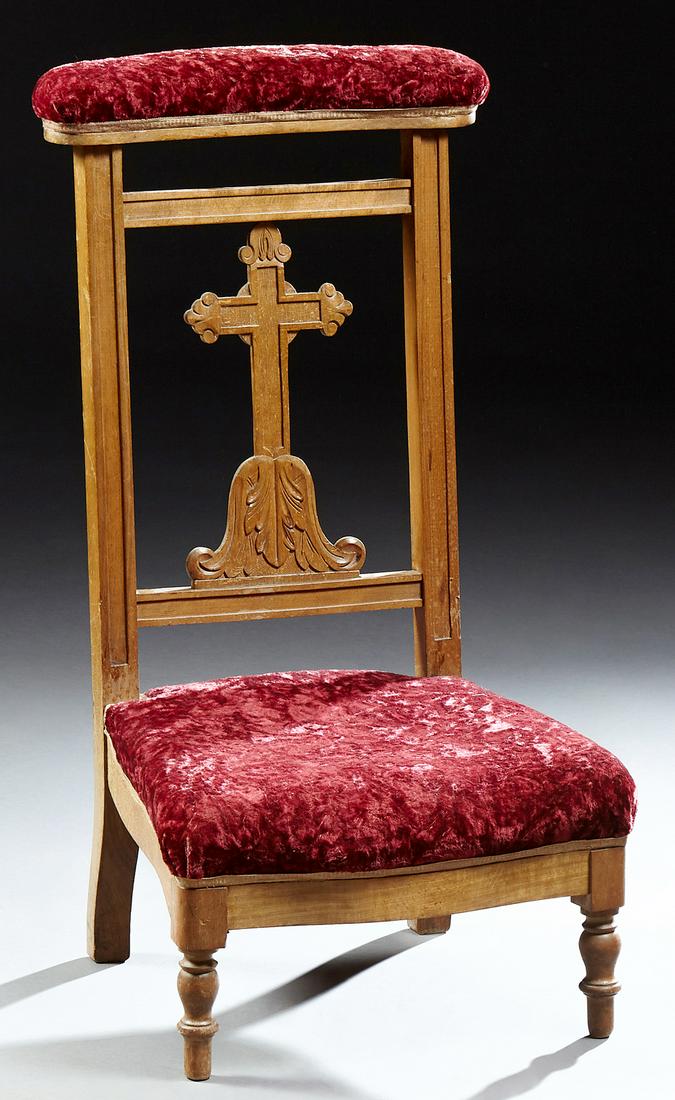 French Provincial Carved Beech Prie Dieu, 19th c., the: French Provincial Carved Beech Prie Dieu, 19th c., the carved upholstered armrest over a cruciform backsplat, to a trapezoidal bowed cushioned seat on turned tapered legs, H. - 36 in., W. - 19 in., D.