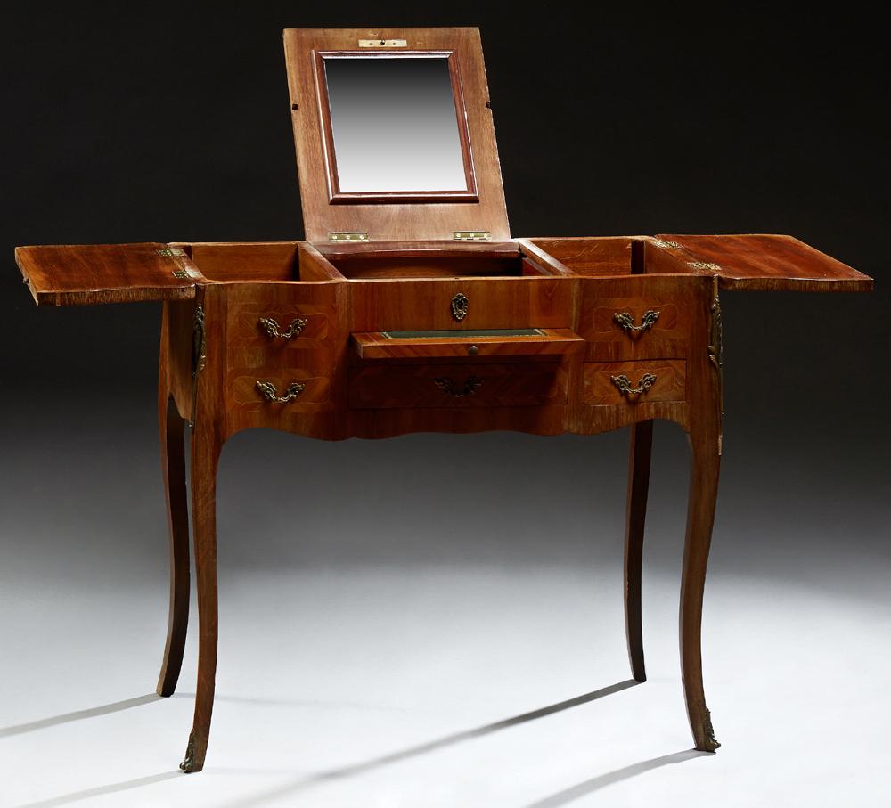 Louis XV Style Inlaid Kingwood Poudreuse, early 20th: Louis XV Style Inlaid Kingwood Poudreuse, early 20th c., the crotched lifting center with an interior mirror, flanked by lifting lid side compartments, over a central inset leather writing slide, abov