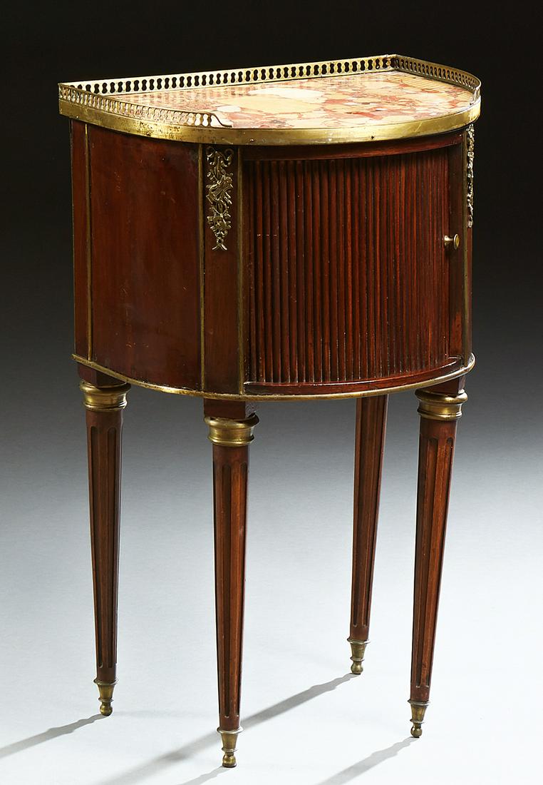 French Louis XVI Style Mahogany Demilune Marble Top: French Louis XVI Style Mahogany Demilune Marble Top Nightstand, late 19th c., the three quarter pierced brass gallery surrounding a Breche D'Alep marble top above a tambour door, on reeded tapered leg