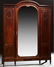 French Inlaid Walnut Armoire, c. 1890, the arched crest