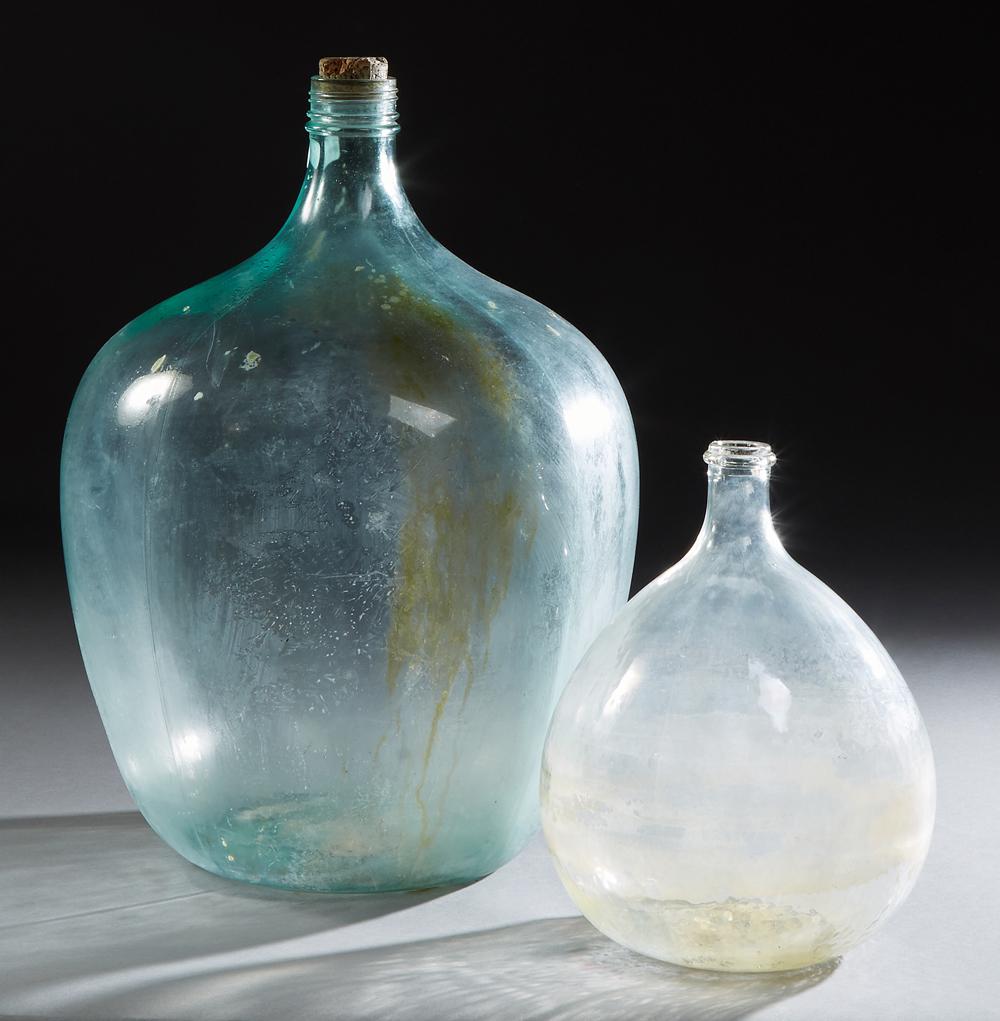 Two French Mold Blown Pale Green Glass Carboys, 19th: Two French Mold Blown Pale Green Glass Carboys, 19th c., Largest- H.- 24 in., Dia.- 18 in.
