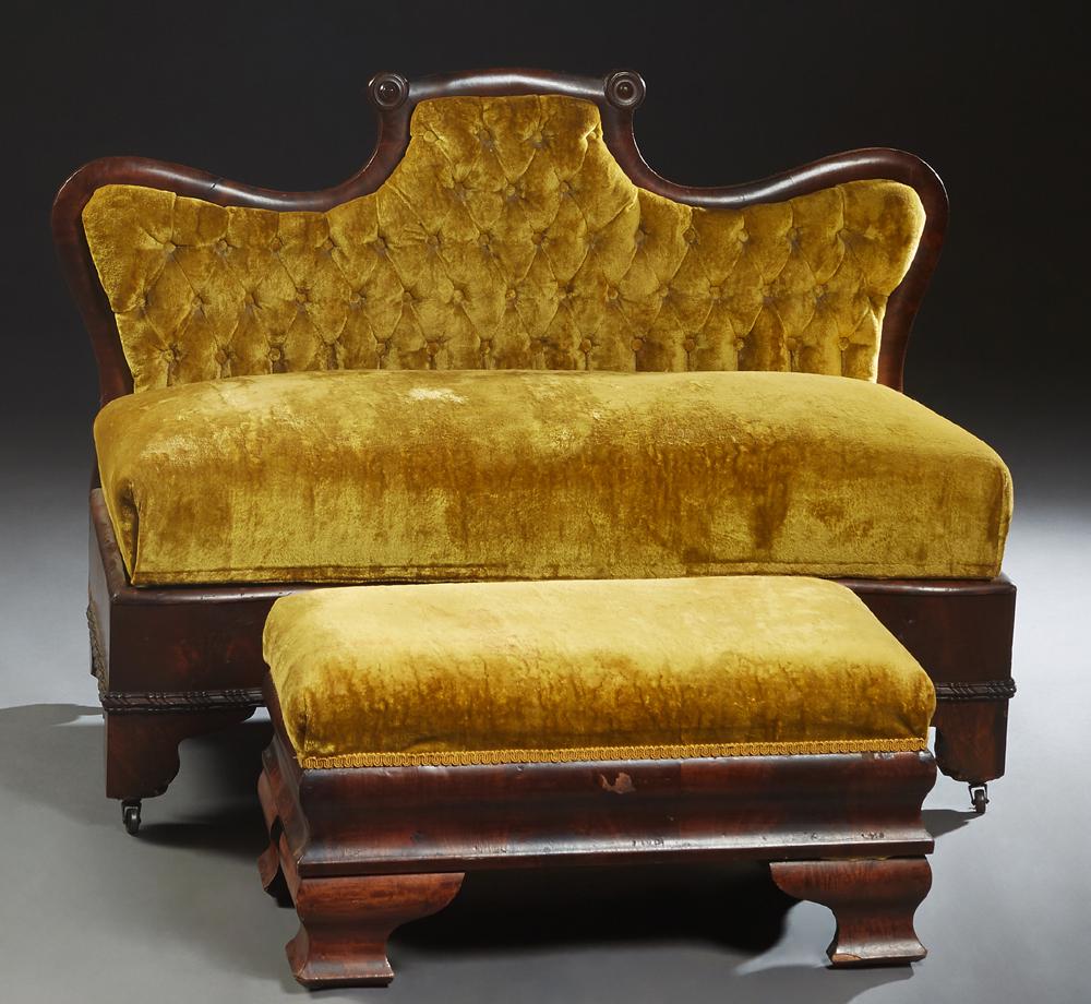 American Carved Mahogany Serpentine Window Seat, c.: American Carved Mahogany Serpentine Window Seat, c. 1860, with a tufted arched shaped back above an upholstered seat with a wide skirt, the whole on block feet with metal casters, H.- 29 1/4 in., W.-