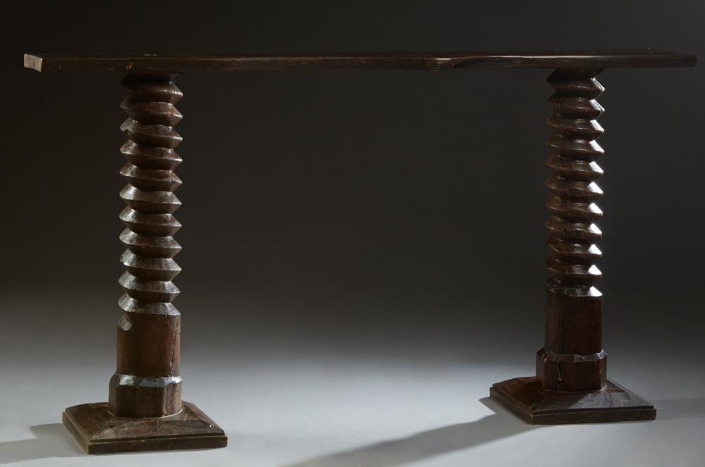 Unusual French Provincial Carved Oak Console Table,: Unusual French Provincial Carved Oak Console Table, 19th c., and later, the bowed top on two wine press screw supports, on square sloping bases, H.- 45 in., W.- 81 in., D.- 17 in. Opening- H.- 43 1/2 