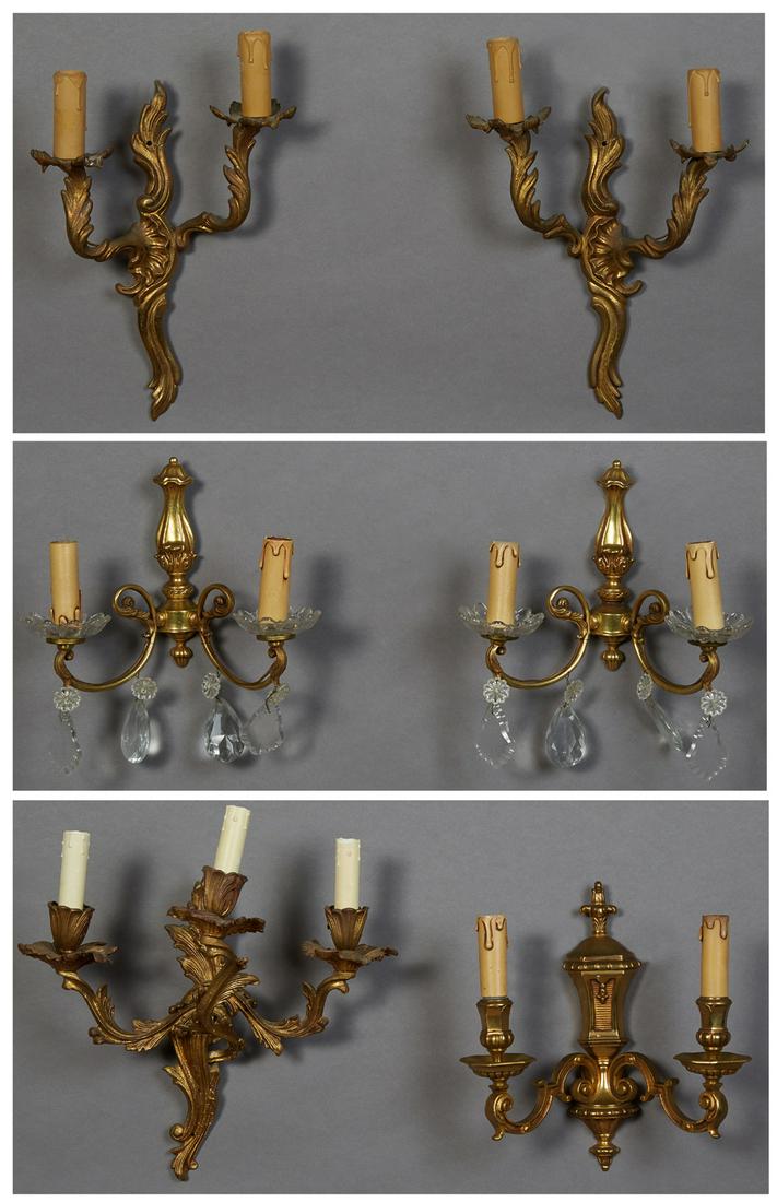 Group of Six French Bronze Sconces, 20th c., consisting: Group of Six French Bronze Sconces, 20th c., consisting of a pair of two light Louis XV examples, with leaf form back plates; a pair of Louis XVI style prism hung examples with glass bobeches and urn 