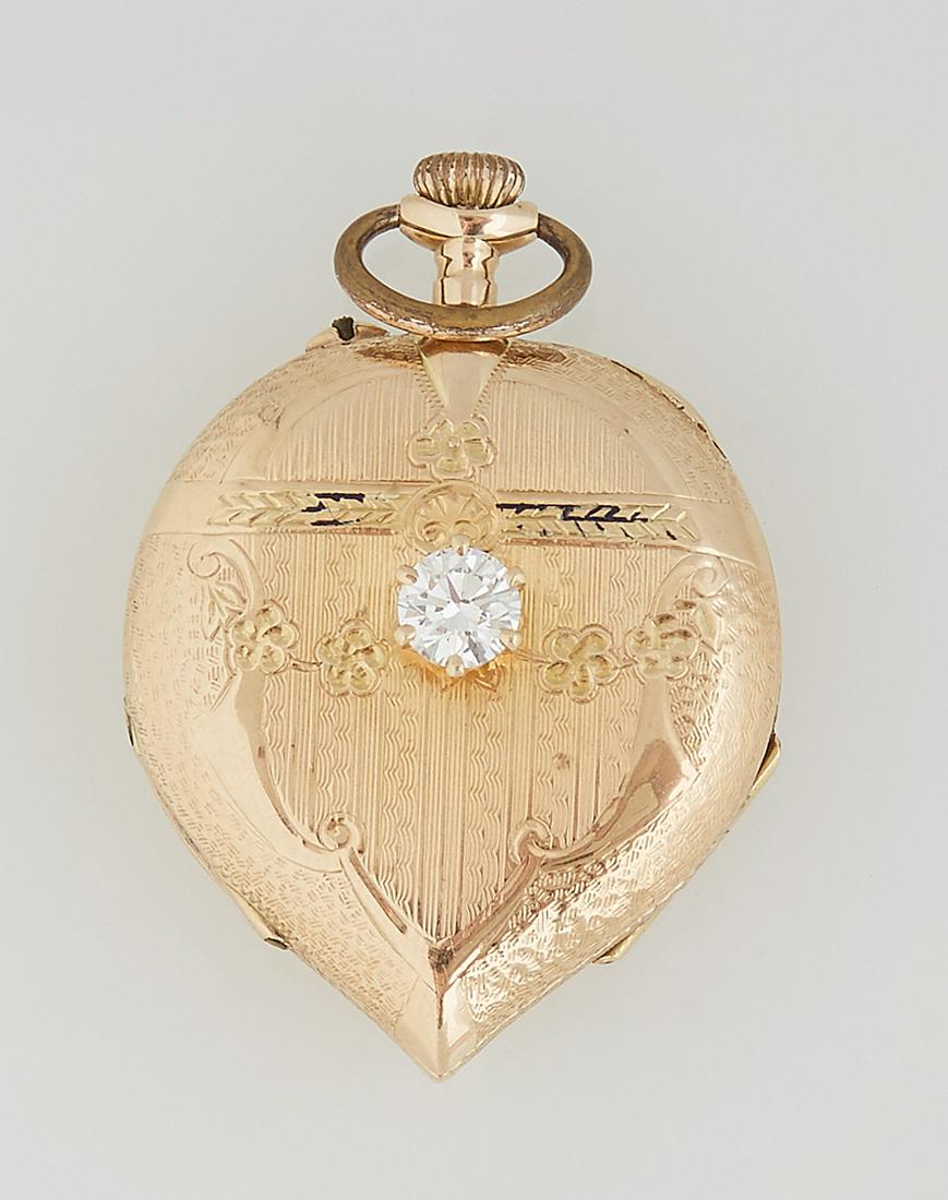 Lady's 14K Yellow Gold Heart Shaped Pendant Watch,: Lady's 14K Yellow Gold Heart Shaped Pendant Watch, early 20th c., by Hesperus, with engraved decoration, the lid with a central .5 ct. round diamond, verso with a central "T" monogram, with a cylinder