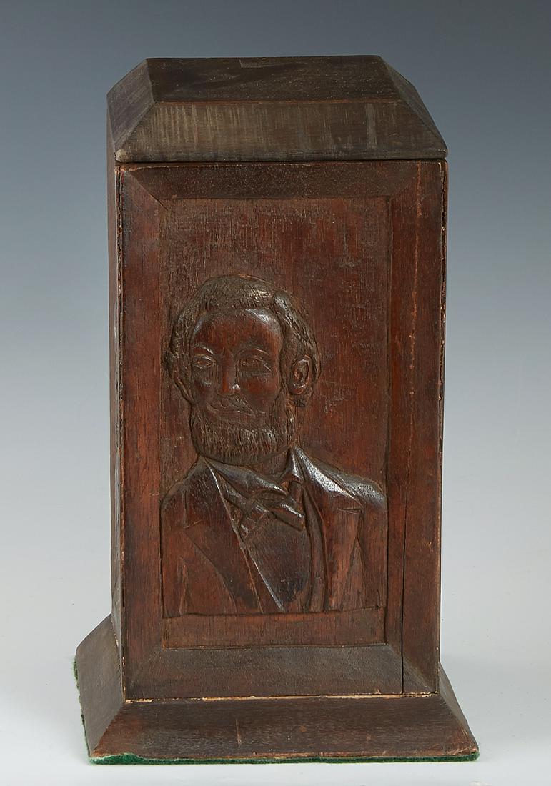 American Civil War Period Folk Art Carved Mahogany: American Civil War Period Folk Art Carved Mahogany Lidded Humidor, c. 1860, the sides with relief carved busts of civil war persona, H.- 10 1/4 in., W.- 5 3/4 in., D.- 6 in.