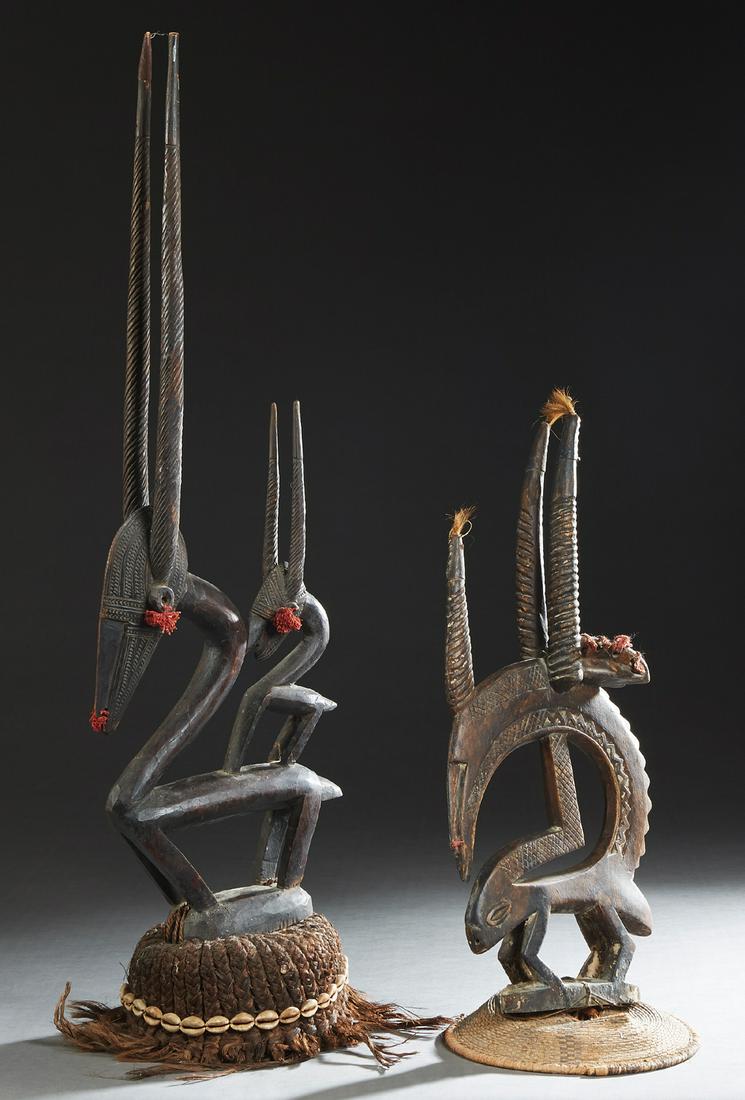 Group of Four African Carved Wood Items, 20th c., (1 of 2)